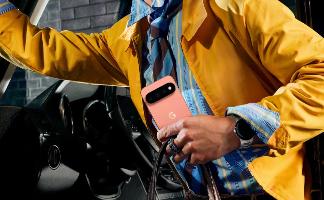 Pixel 11 Pro in Canyon held in hand — lifestyle photo
