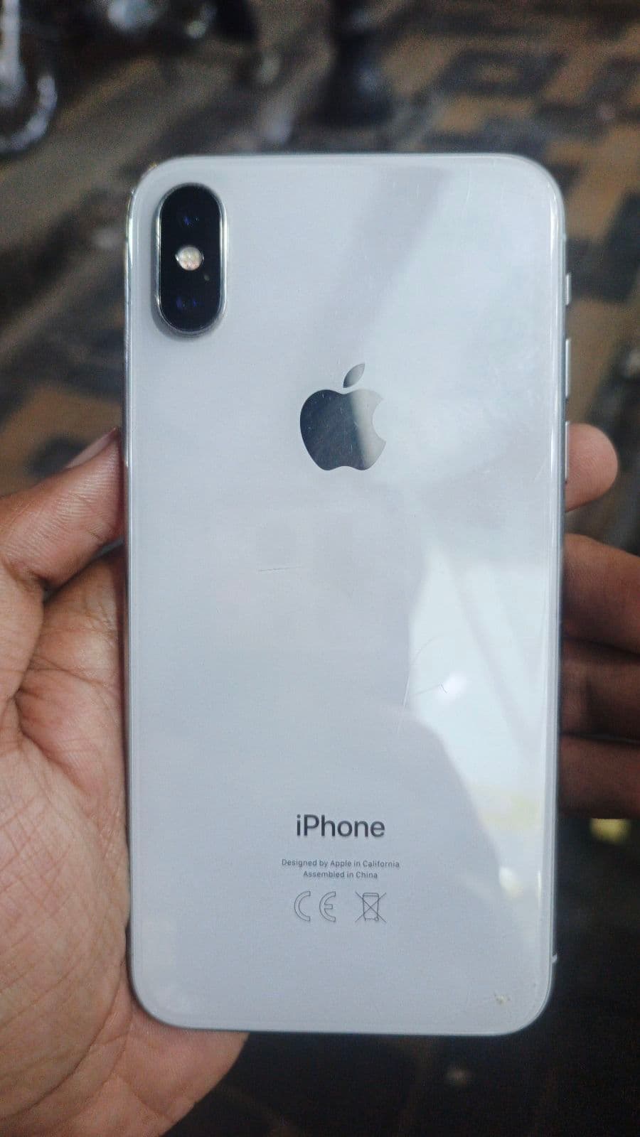 iPhone X · 64GB