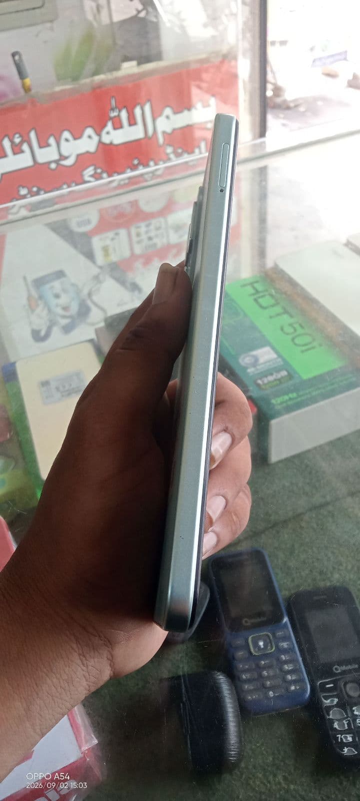 Infinix Hot 50i 6GB / 128GB in Sea Blue — photo 2