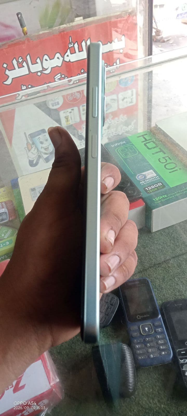 Infinix Hot 50i 6GB / 128GB in Sea Blue — photo 3