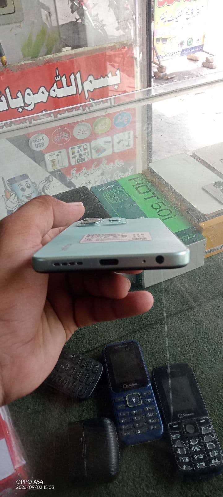 Infinix Hot 50i 6GB / 128GB in Sea Blue — photo 4