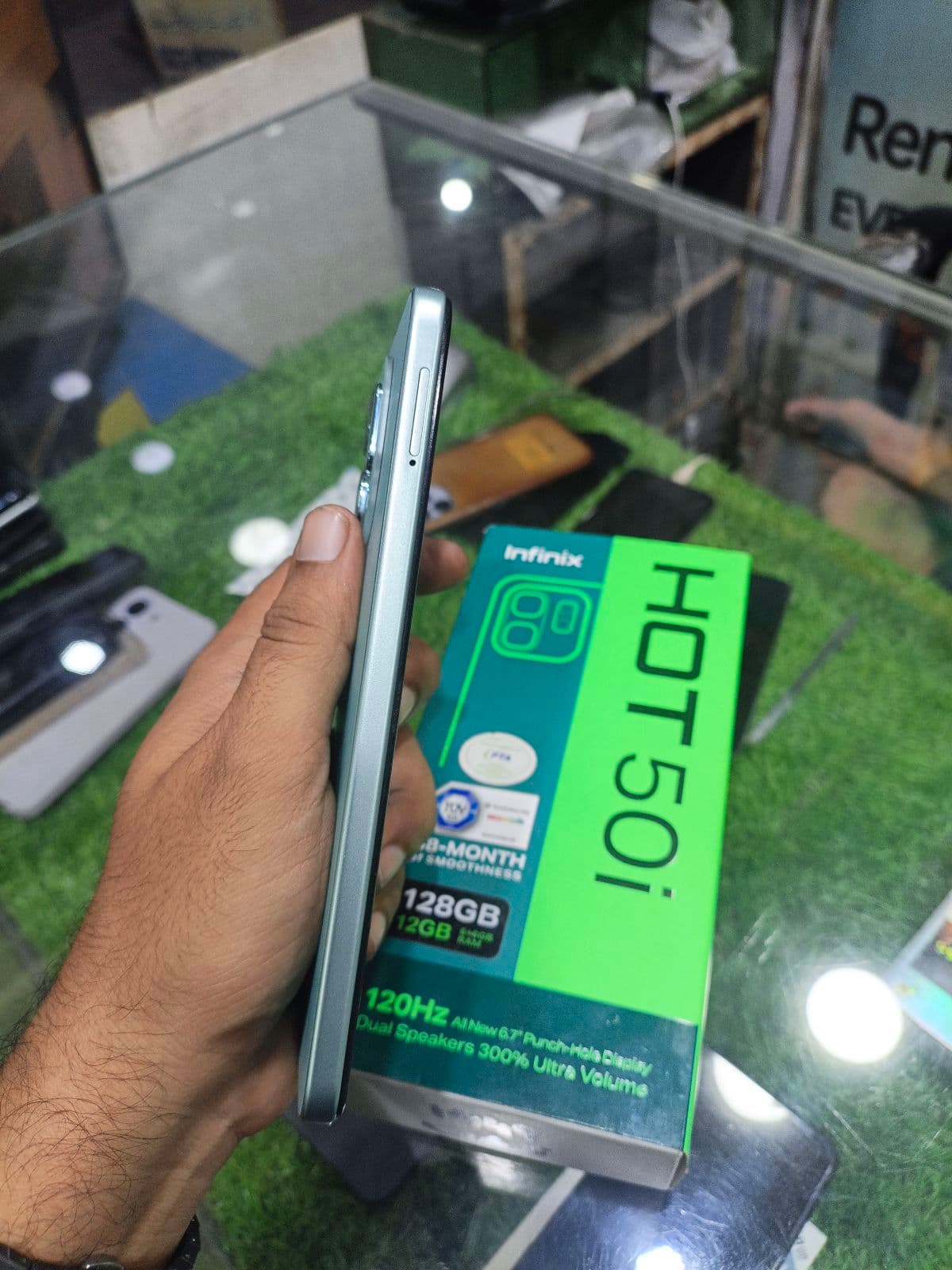 Infinix Hot 50i 6GB / 128GB in Sage Green — photo 3