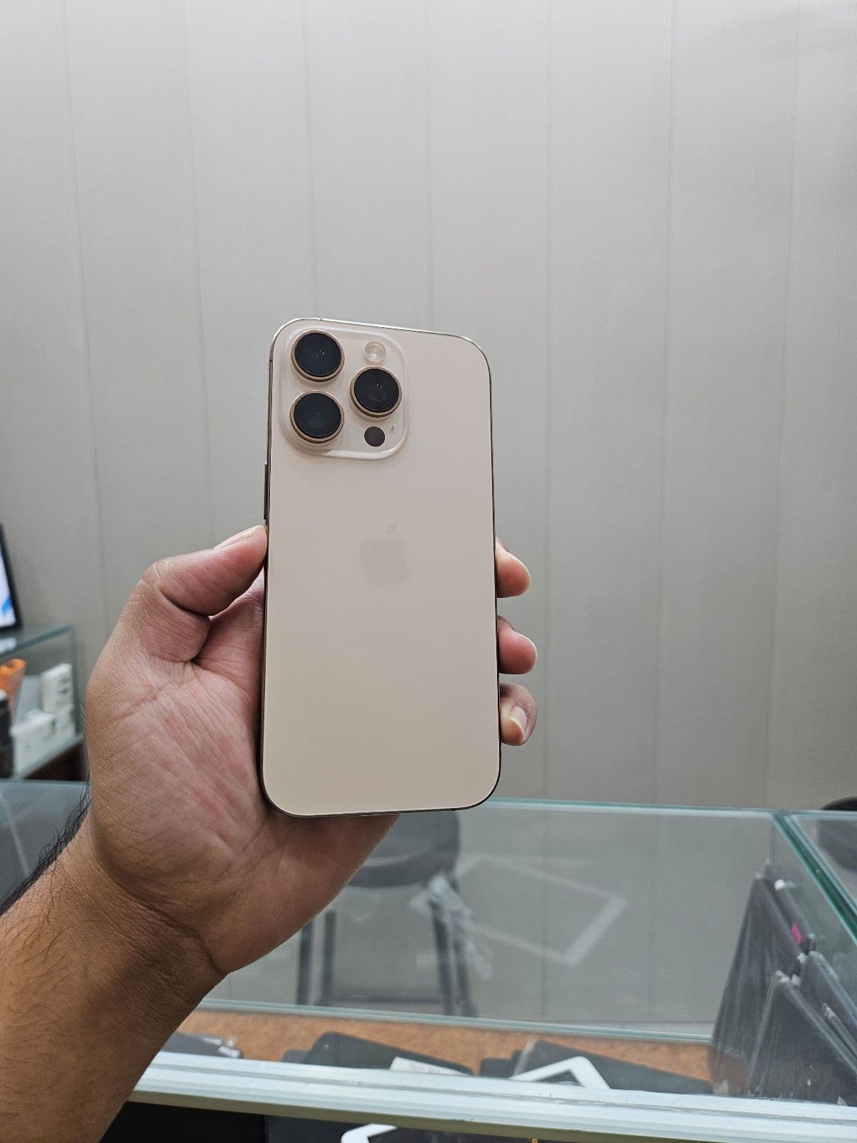 Apple iPhone 16 Pro 128GB in Desert Titanium — photo 1