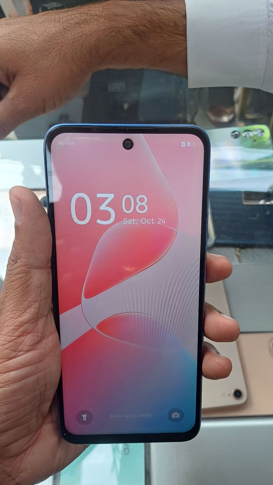 Infinix Hot 60i 6GB / 128GB in Shadow Blue — photo 2