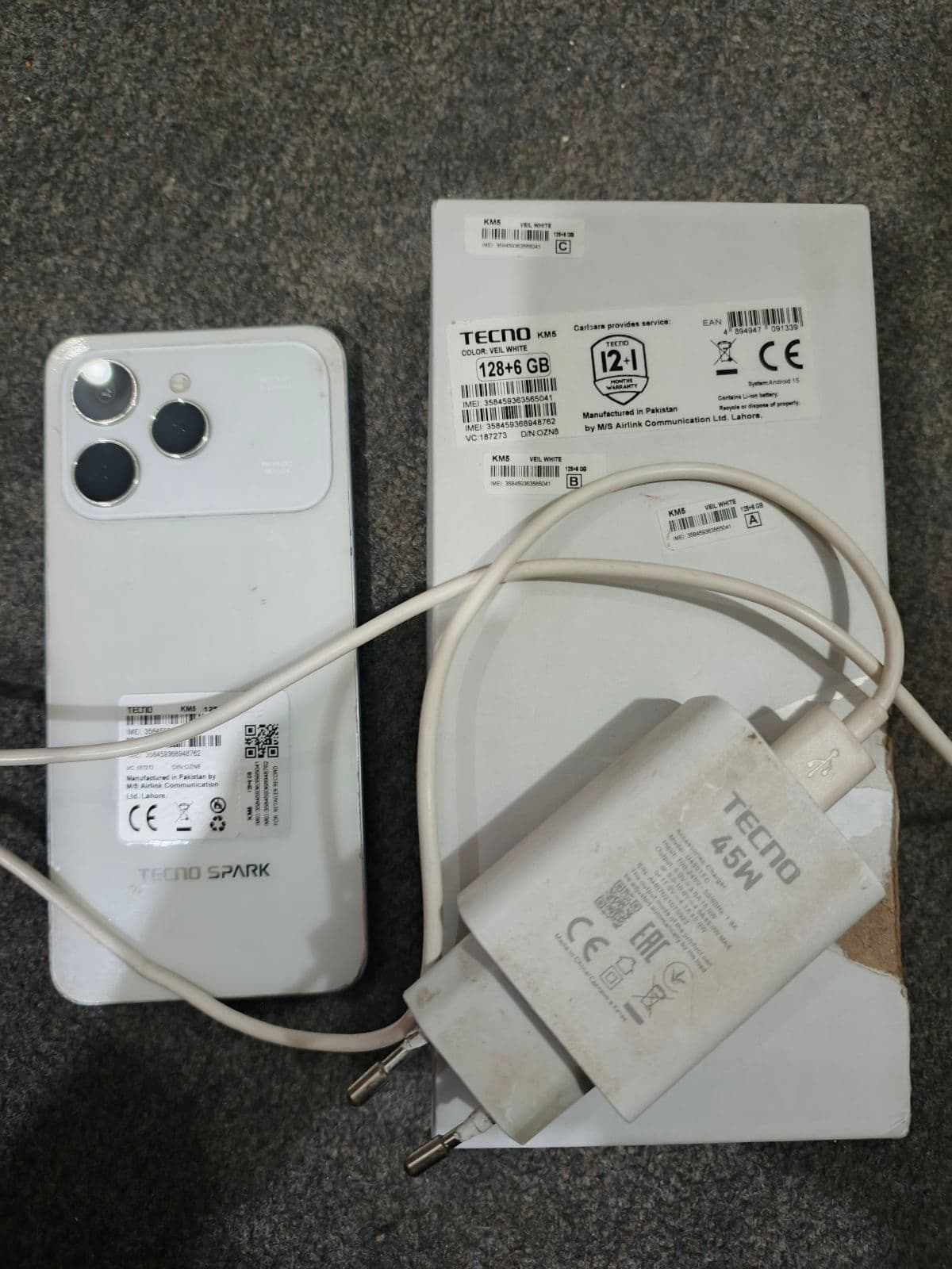 Tecno Spark 40 6GB / 128GB in Veil White — photo 1