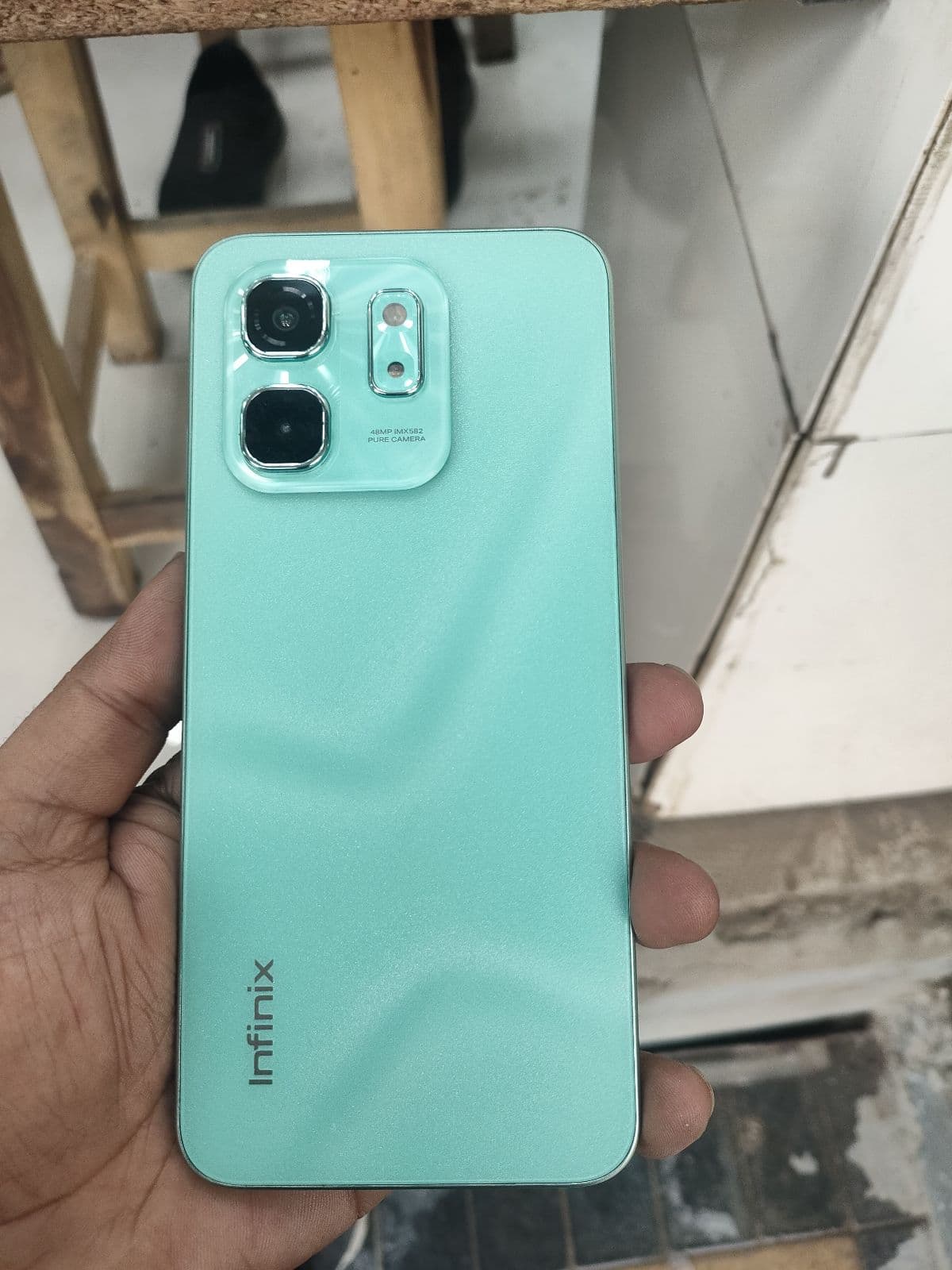 Infinix Hot 50i 6GB / 128GB in Sea Blue — photo 3