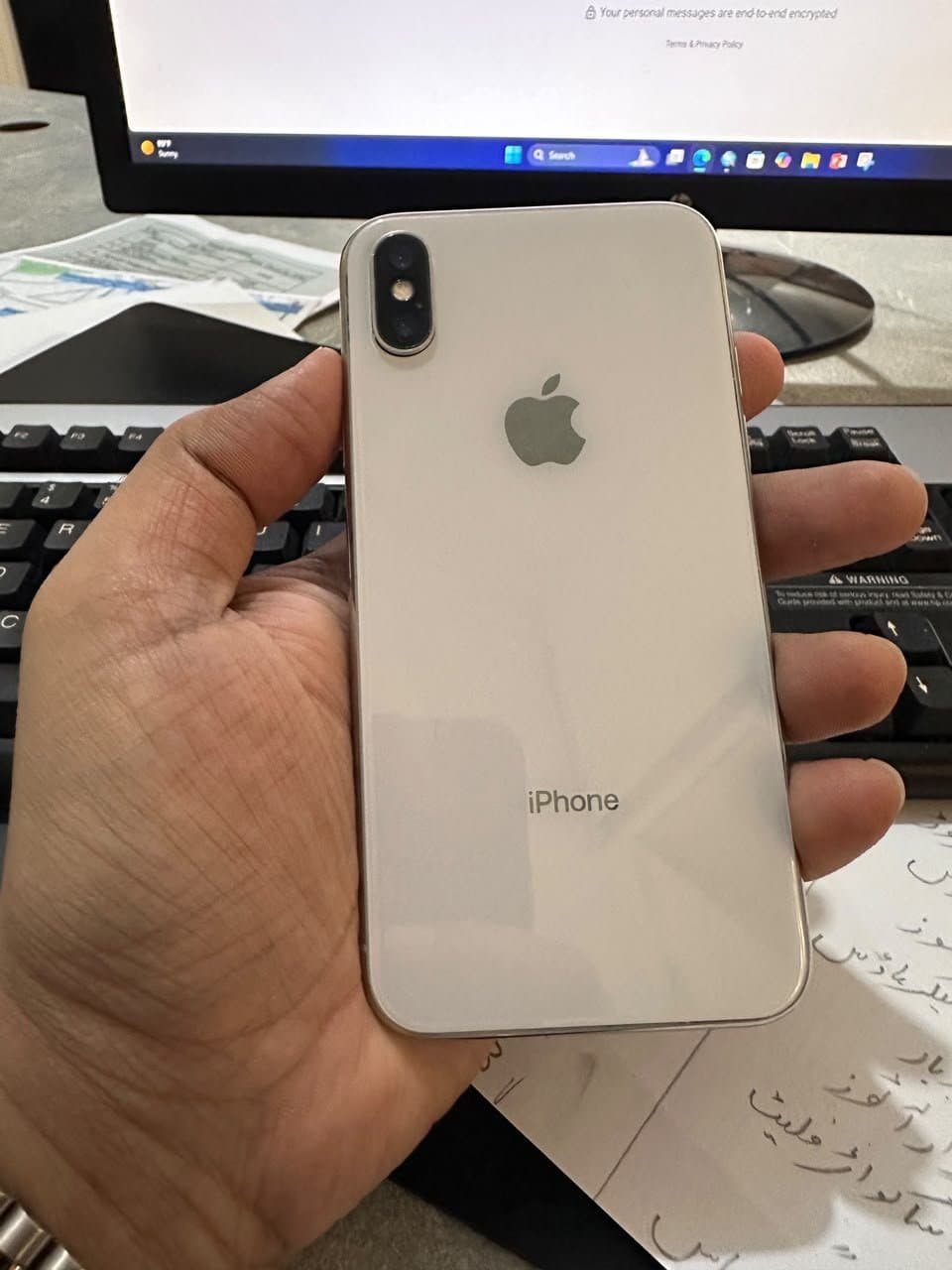 iPhone X · 64GB